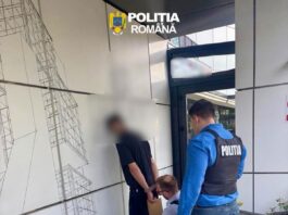 Bacău. Doi bărbați prinși după ce au încercat să mituiască un polițist cu 2500 de euro